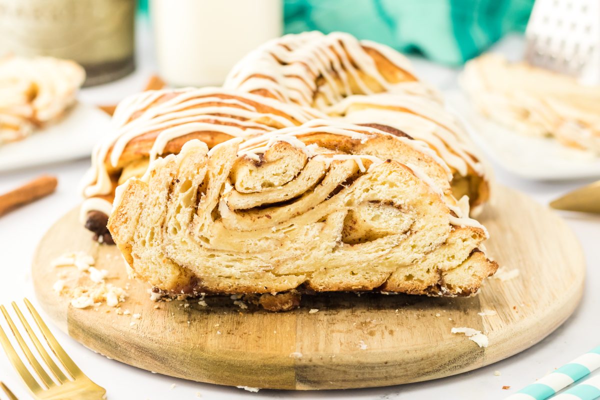 Front view of slices of glazed twist bread with cinnamon swirls throught the crumb. Hostess At Heart