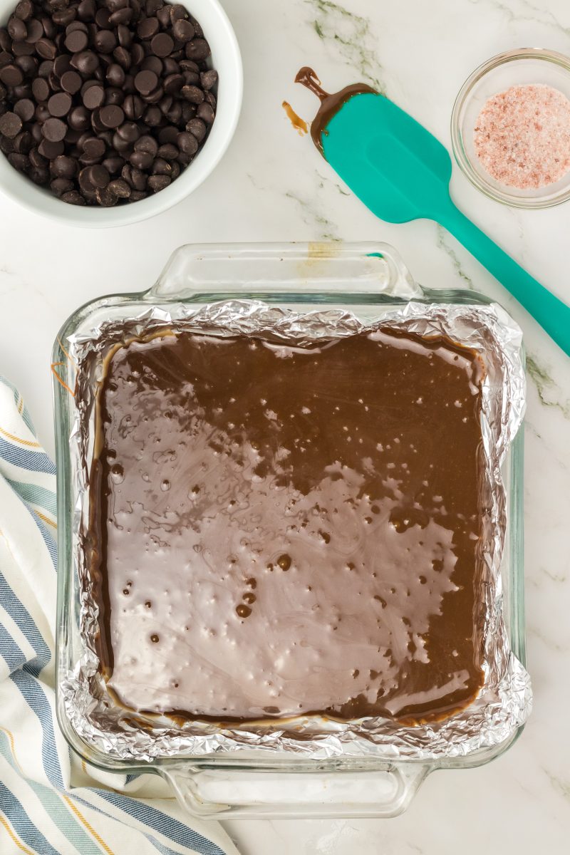 Hot chocolate mixture in an 8x8 baking dish.