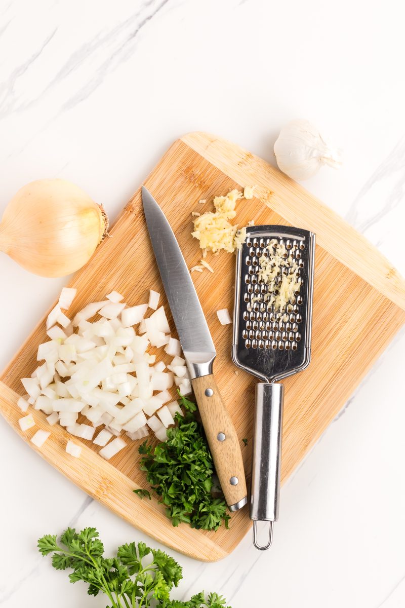 Chopping the onions and grating the garlic. Hostess At Heart