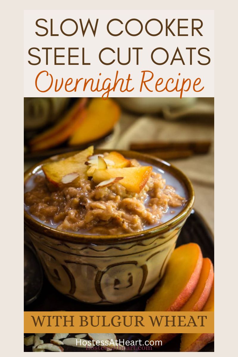 Sideview of a bowl filled with slow cooker steel cut oats and bulgur. It's topped with sliced peaches and almond slivers. Hostess At Heart