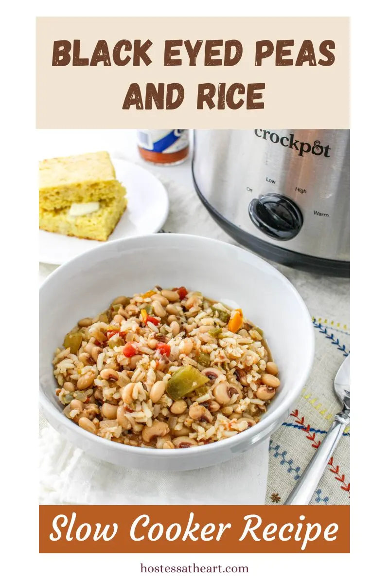 A bowl filled with black eye peas, rice, and veggies with a slow cooker in the background - Hostess At Heart