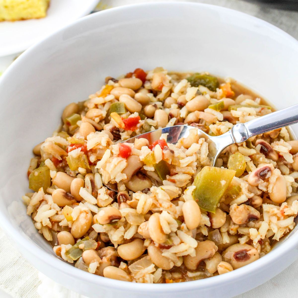 Closeup angled view of a bowl of Black Eyed Peas and rice - Hostess At Heart