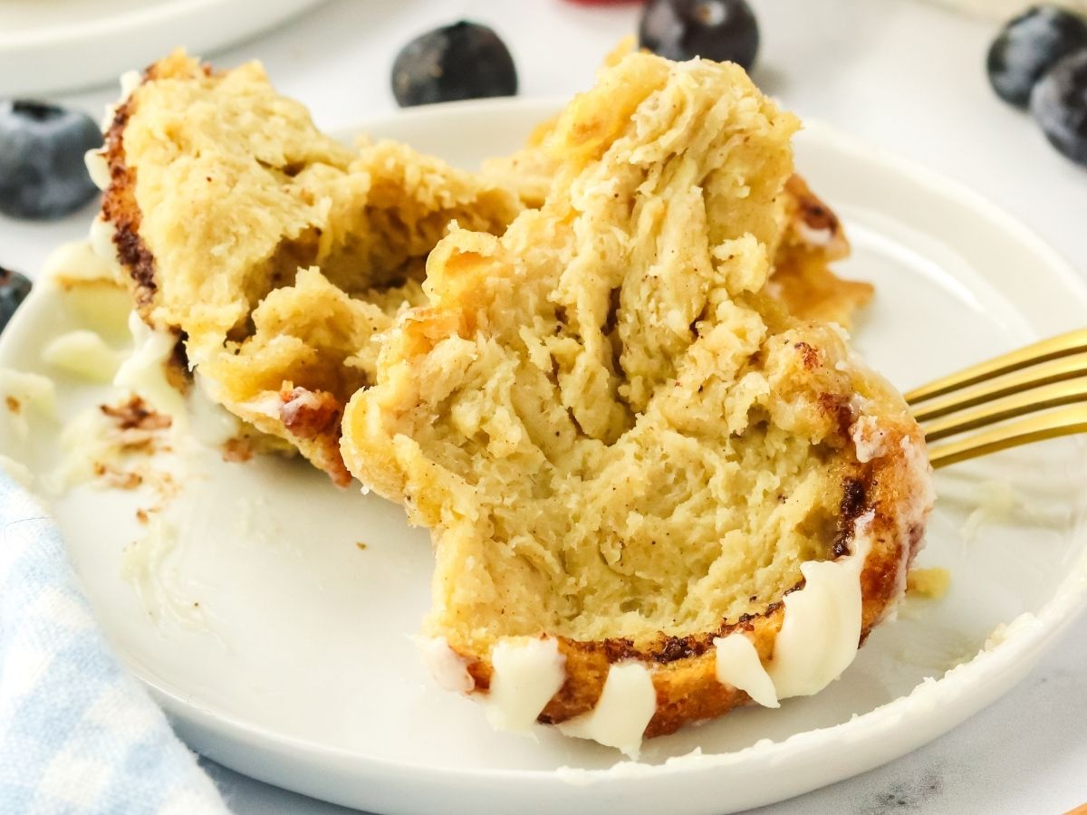 Plate holding a baked popover that's been split open - Hostess At Heart