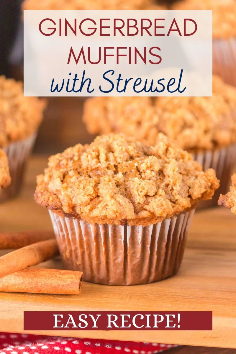 Sideview of a baked gingerbread muffin topped with crunchy streusel topping. Hostess At Heart