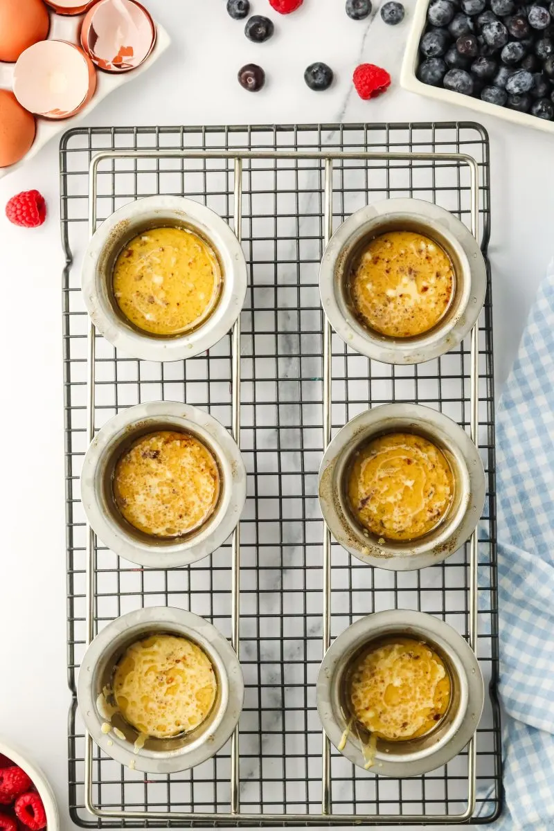 Top down view of popover cups filled with batter - Hostess At Heart