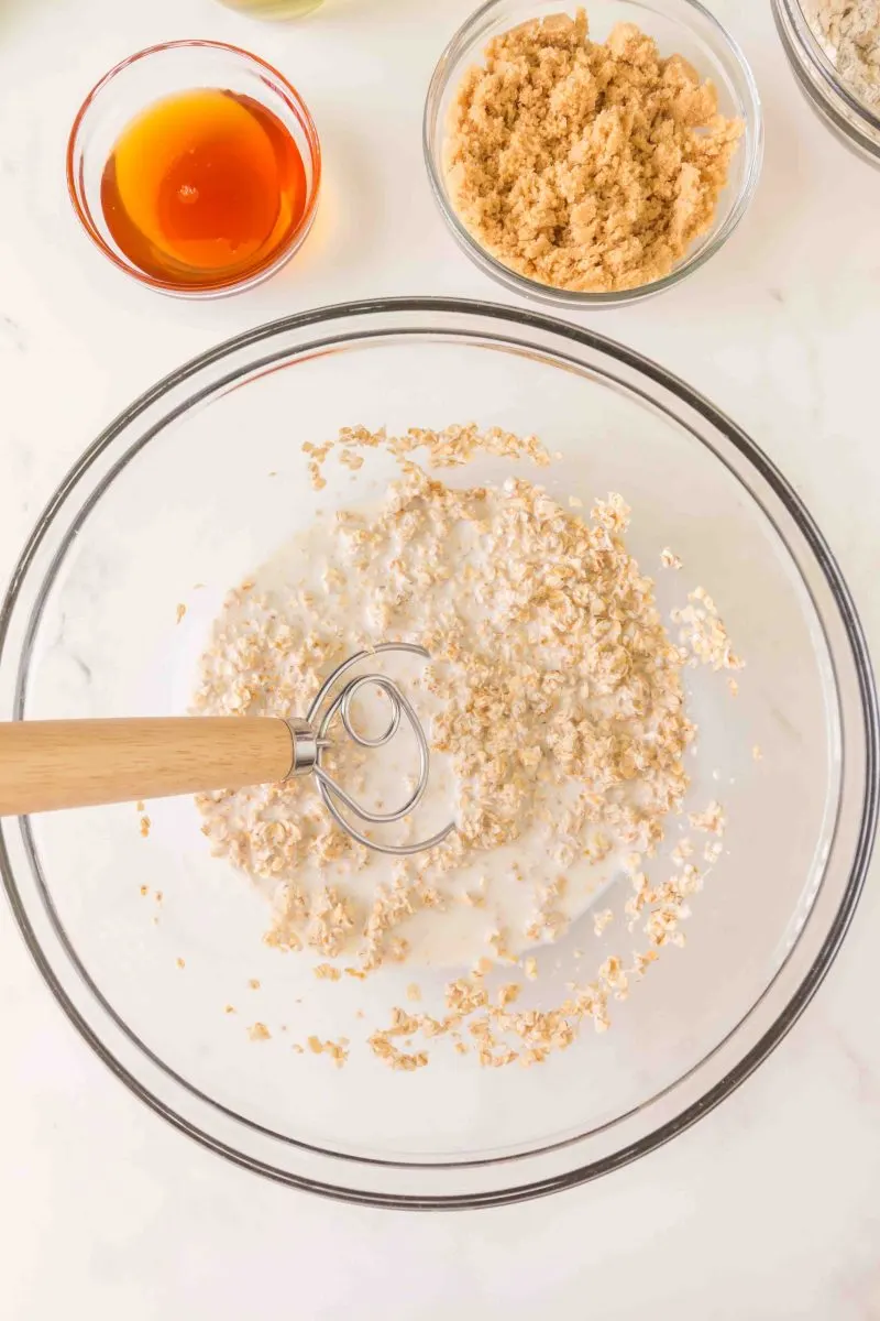 A mixing bowl filled with oats and milk - Hostess At Heart