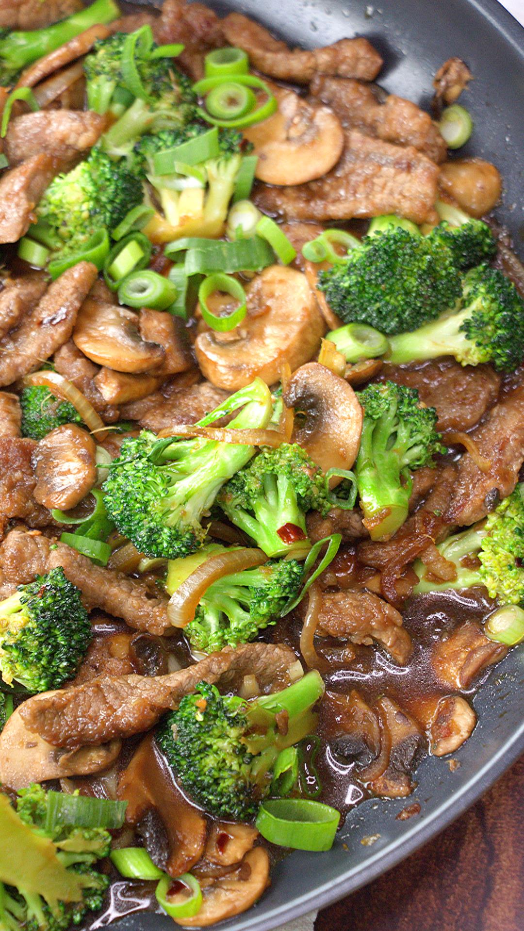 Close up of beef and broccoli stir fry in the skillet.