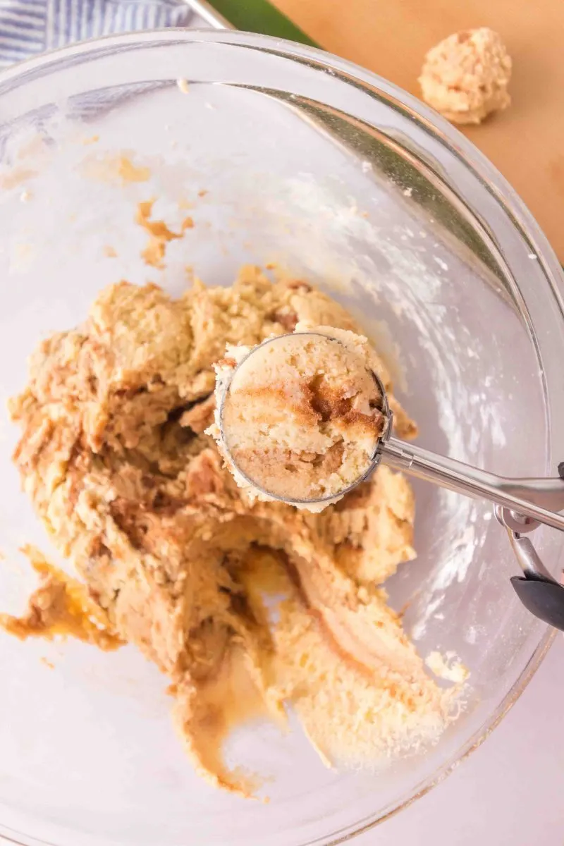 A scoop filled with cookie dough batter swirled with a cinnamon mix. Hostess At Heart