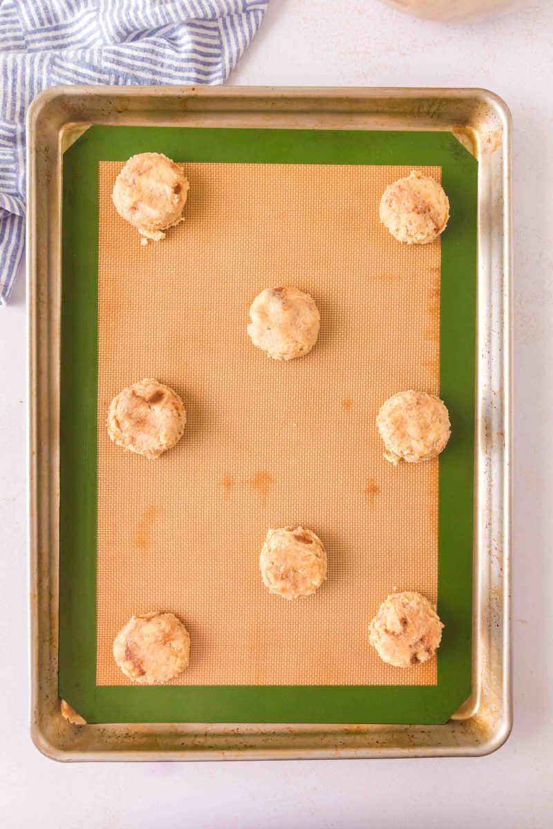 A silicone mat filled with cookie dough