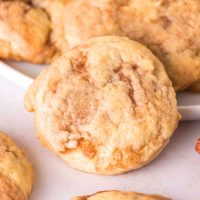 Front view of a cookie with swirls of cinnamon running throughout. Hostess At Heart