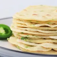 Sideview of a stack of jalapeno tortillas - Hostess At Heart