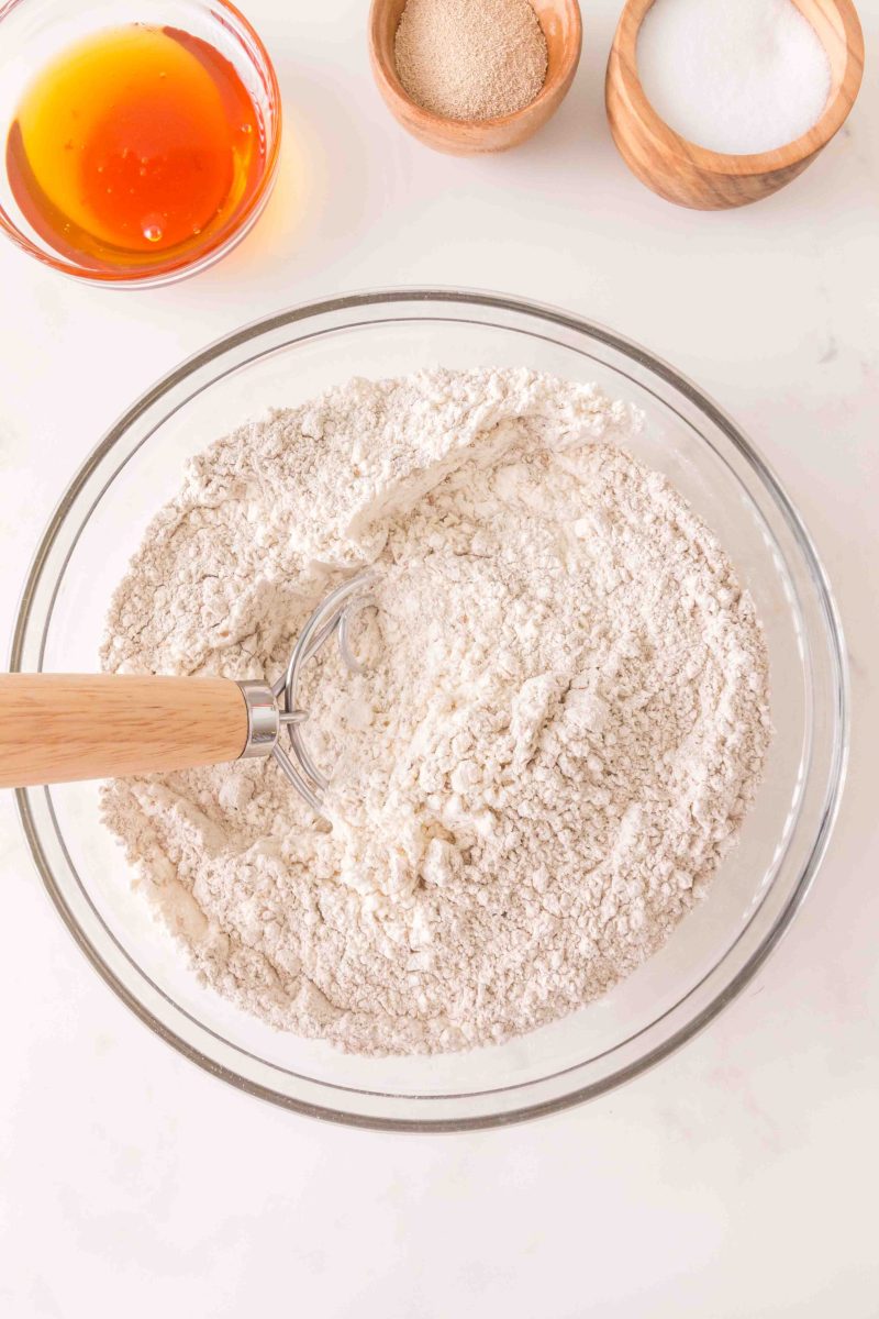 Mixing the dry ingredients with a dough hook.