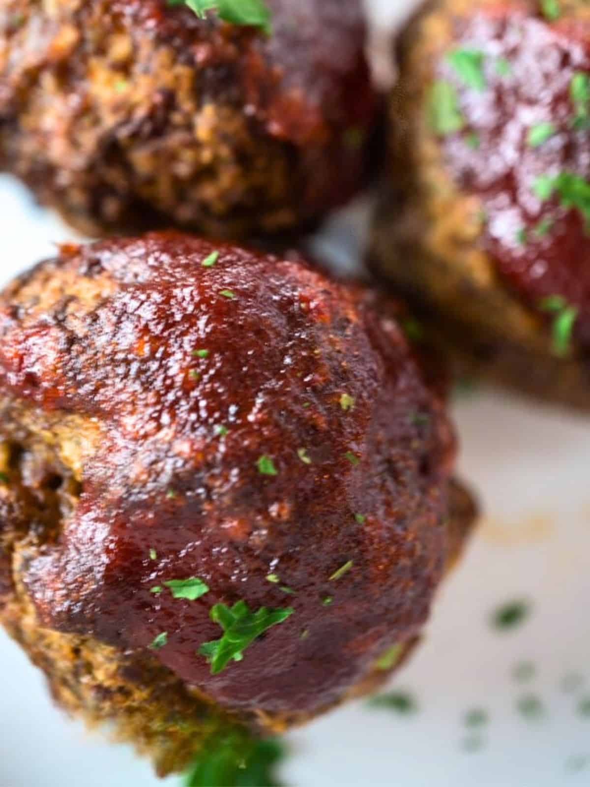 Top down view of glazed meatballs made with an easy meatloaf recipe - Hostess At Heart