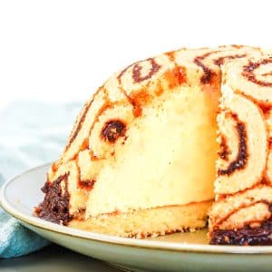 A tableview of a cake shaped into a dome and filled Bavarian Cream. Hostess At Heart