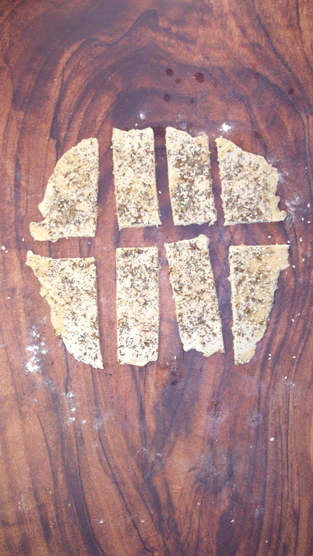 Dough cut into strips of cracker size.