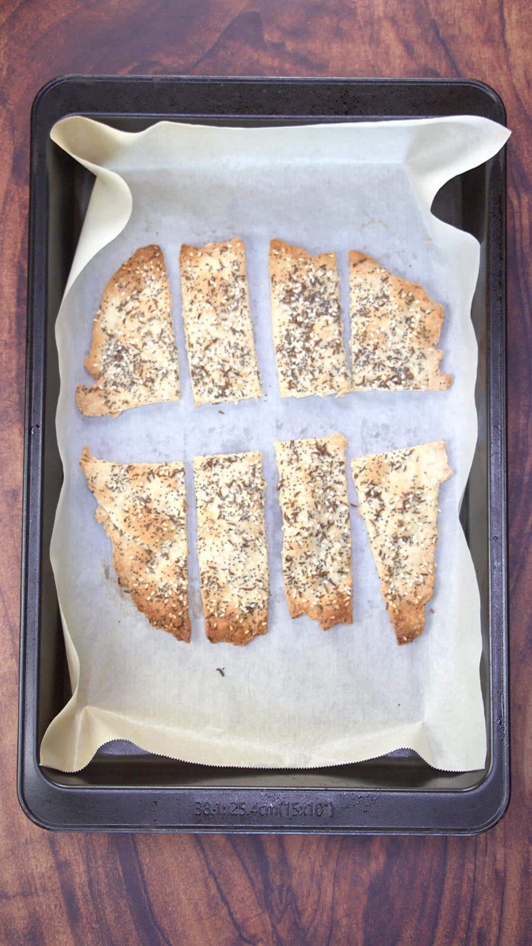 Baked crackers on a sheet pan.