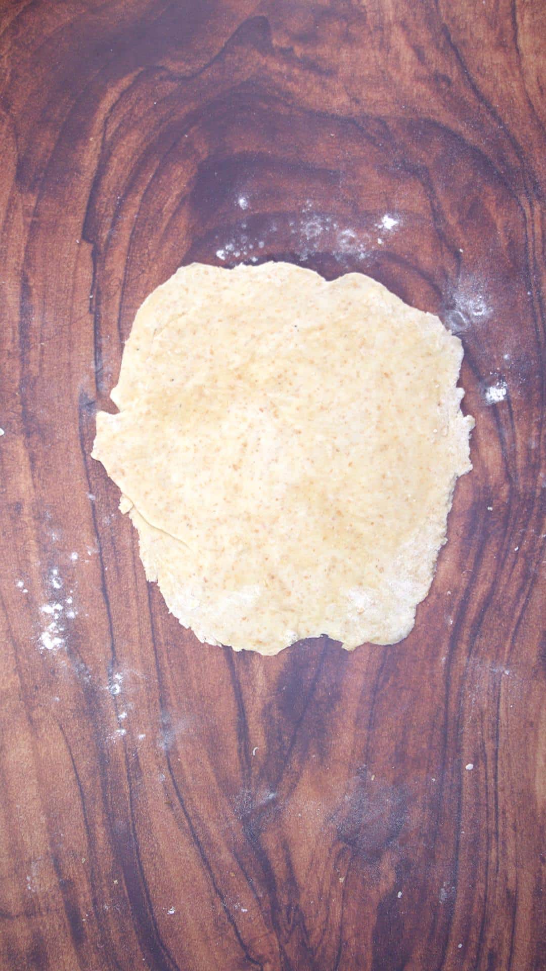 Rolled out cracker dough.