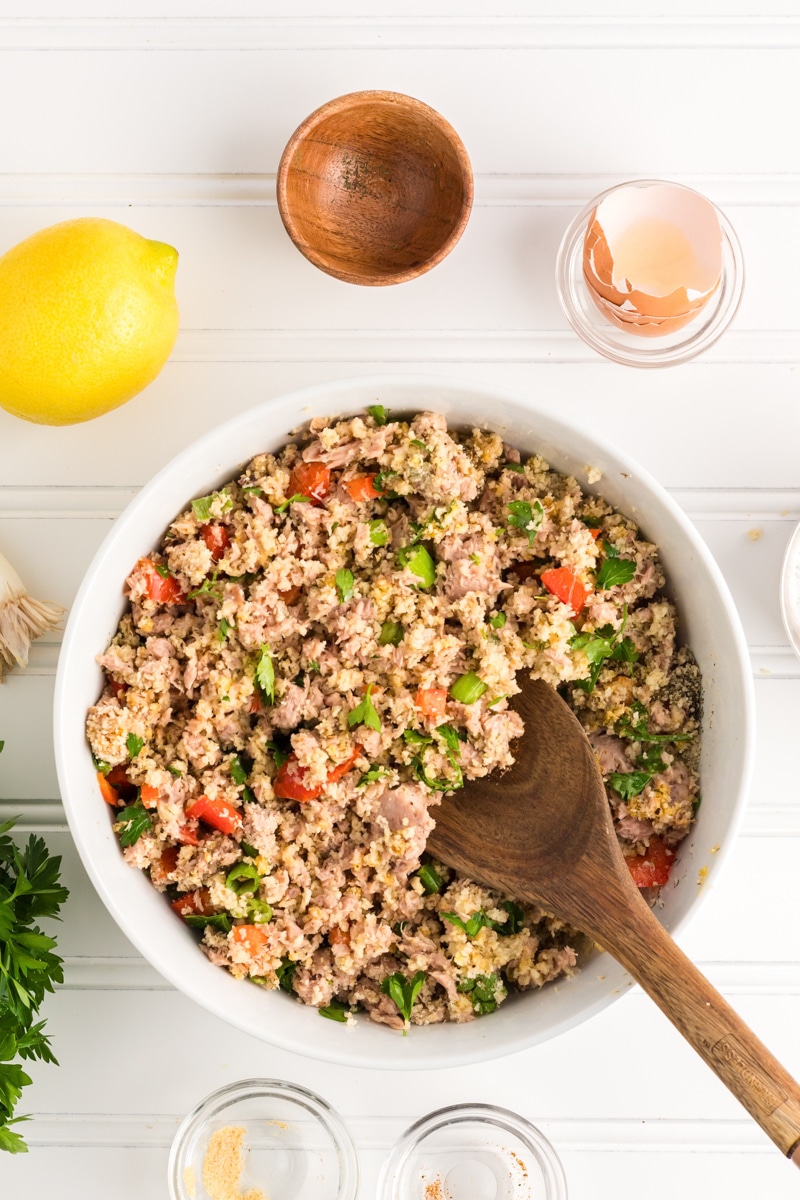 Canned tuna patties ingredients mixed together in a mixing bowl. Hostess At Heart