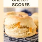 Sideview of an image for Pinterest of a cheesy sourdough discard scone. Hostess At Heart