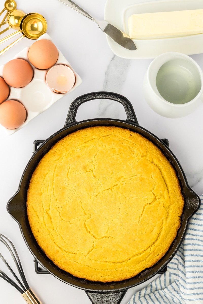Top down view of cast iron skillet cornbread - Hostess At Heart