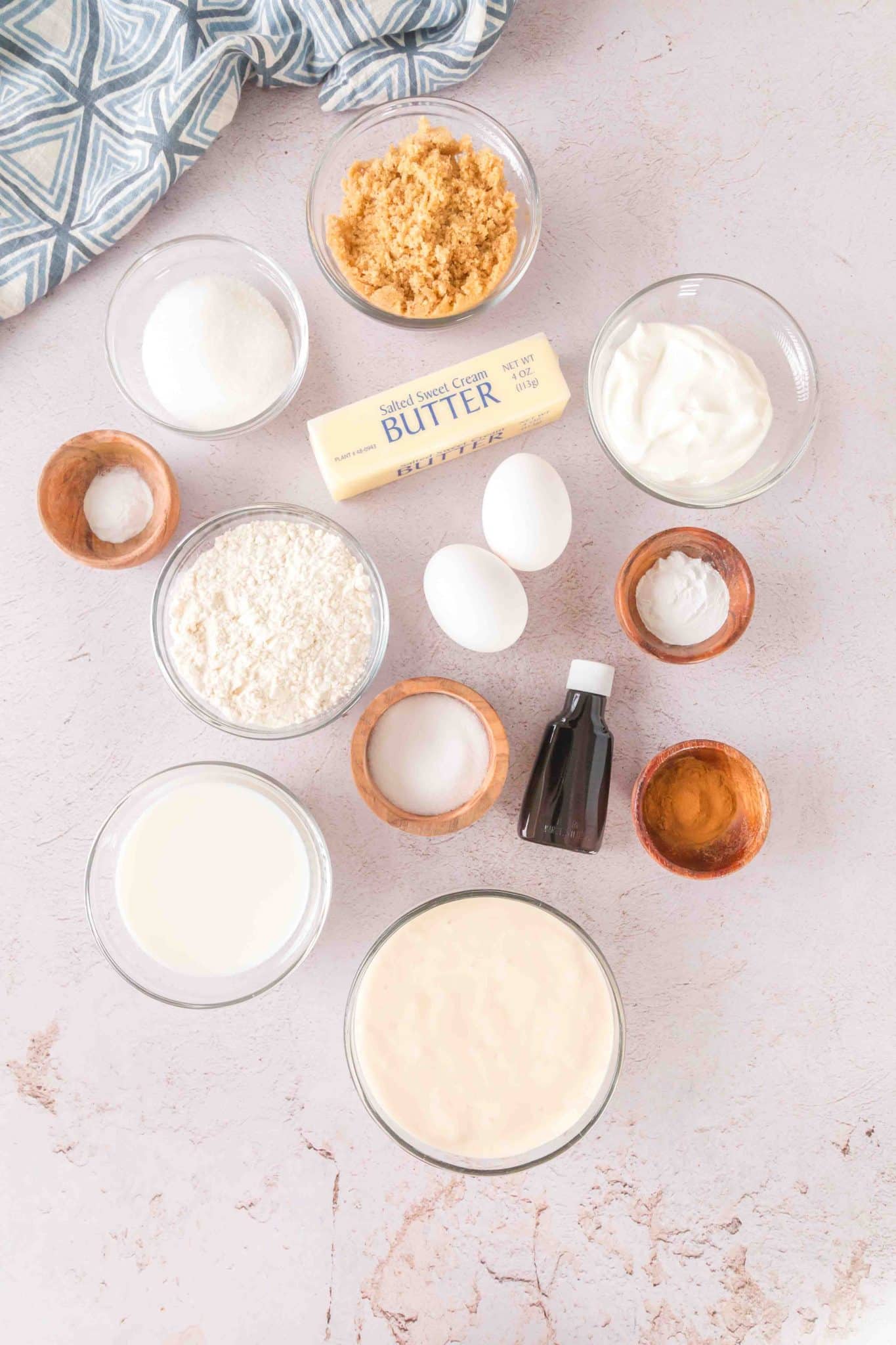Ingredients: Brown sugar, sugar, butter, salt, sour cream, eggs, flour, baking soda, baking powder, vanilla, sourdough discard, sour cream, and milk.