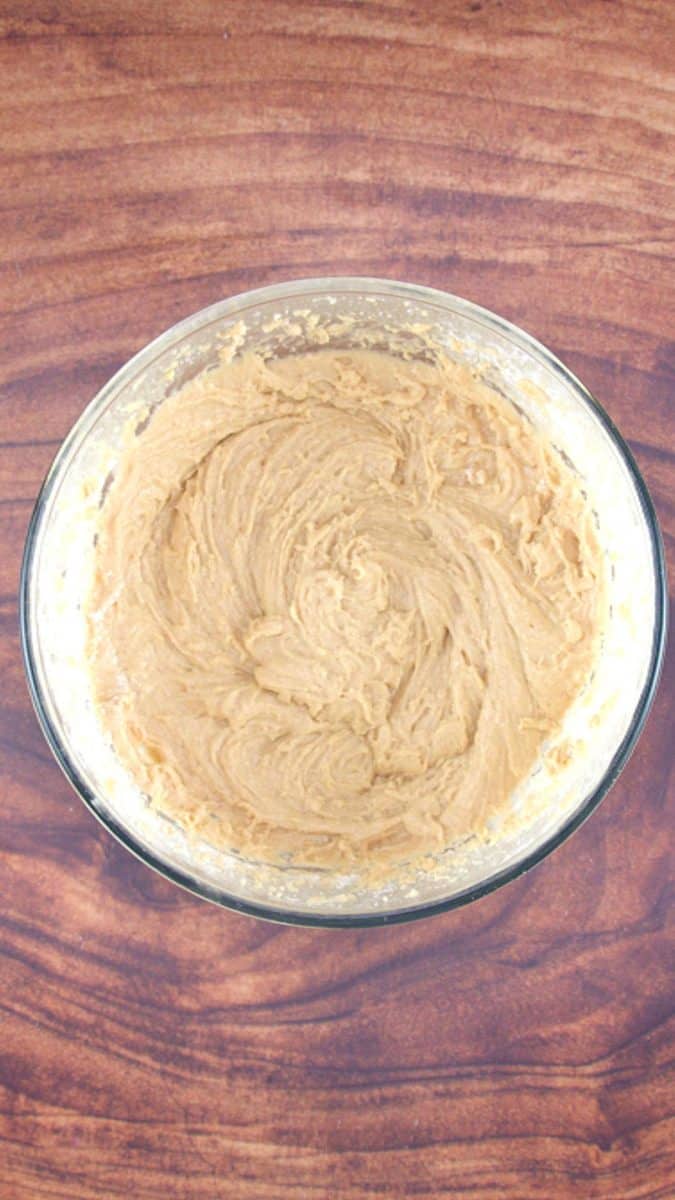 Top down view of apple cake batter before the apples have been folded in - Hostess At Heart