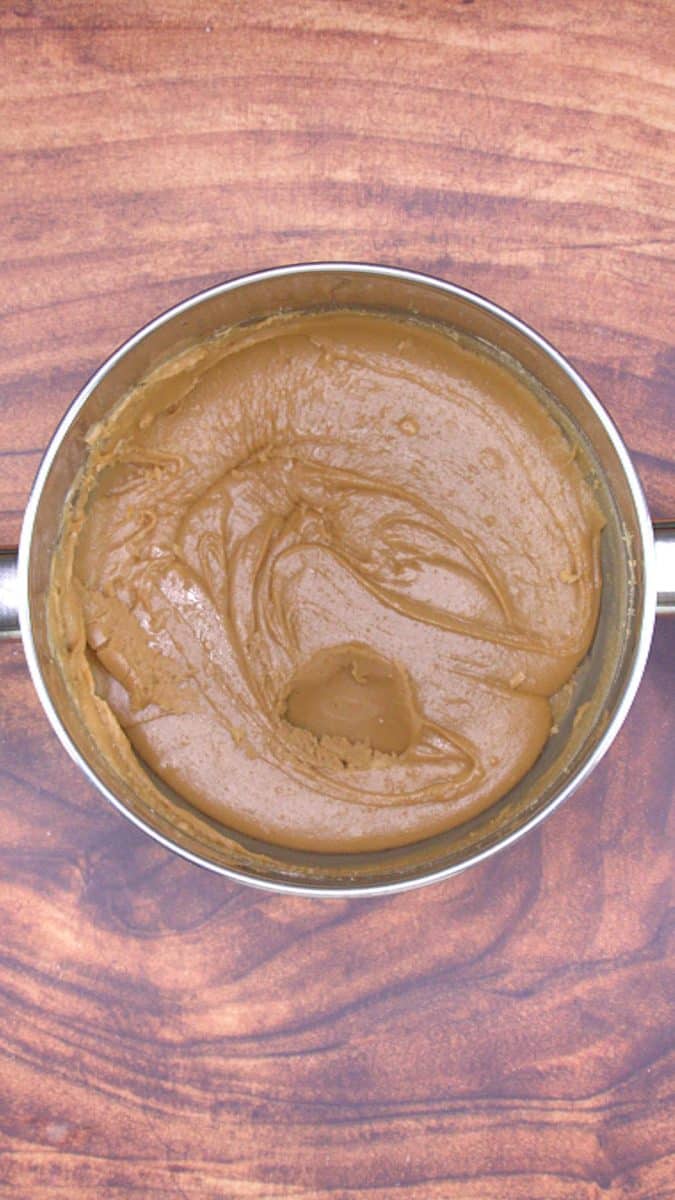 A bowl filled with boiled caramel icing - Hostess At Heart