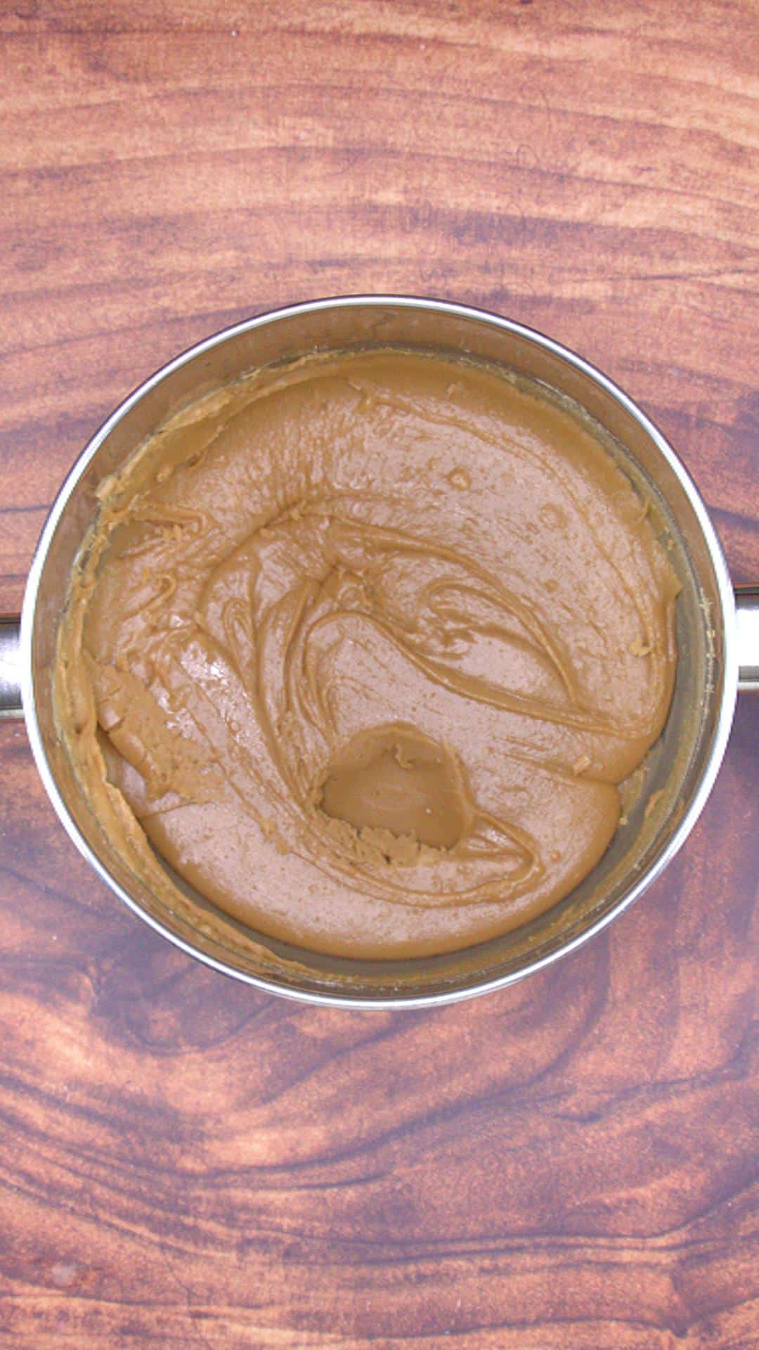 A bowl filled with boiled caramel icing - Hostess At Heart