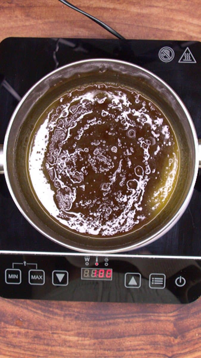 Top down view of butter and brown sugar in a skillet