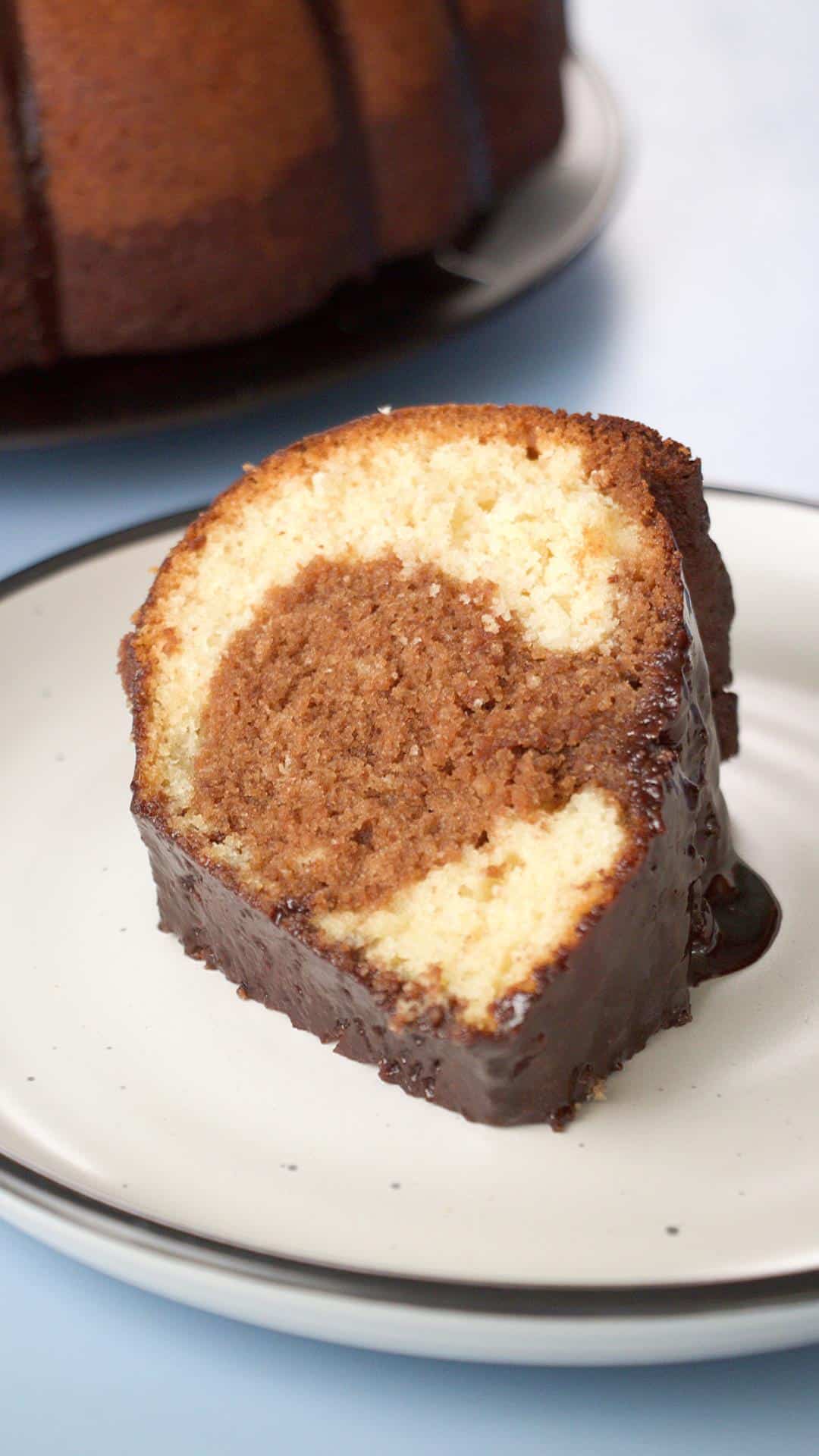 Closeup view of a slice of cake made with Hershey's Syrup - Hostess At Heart