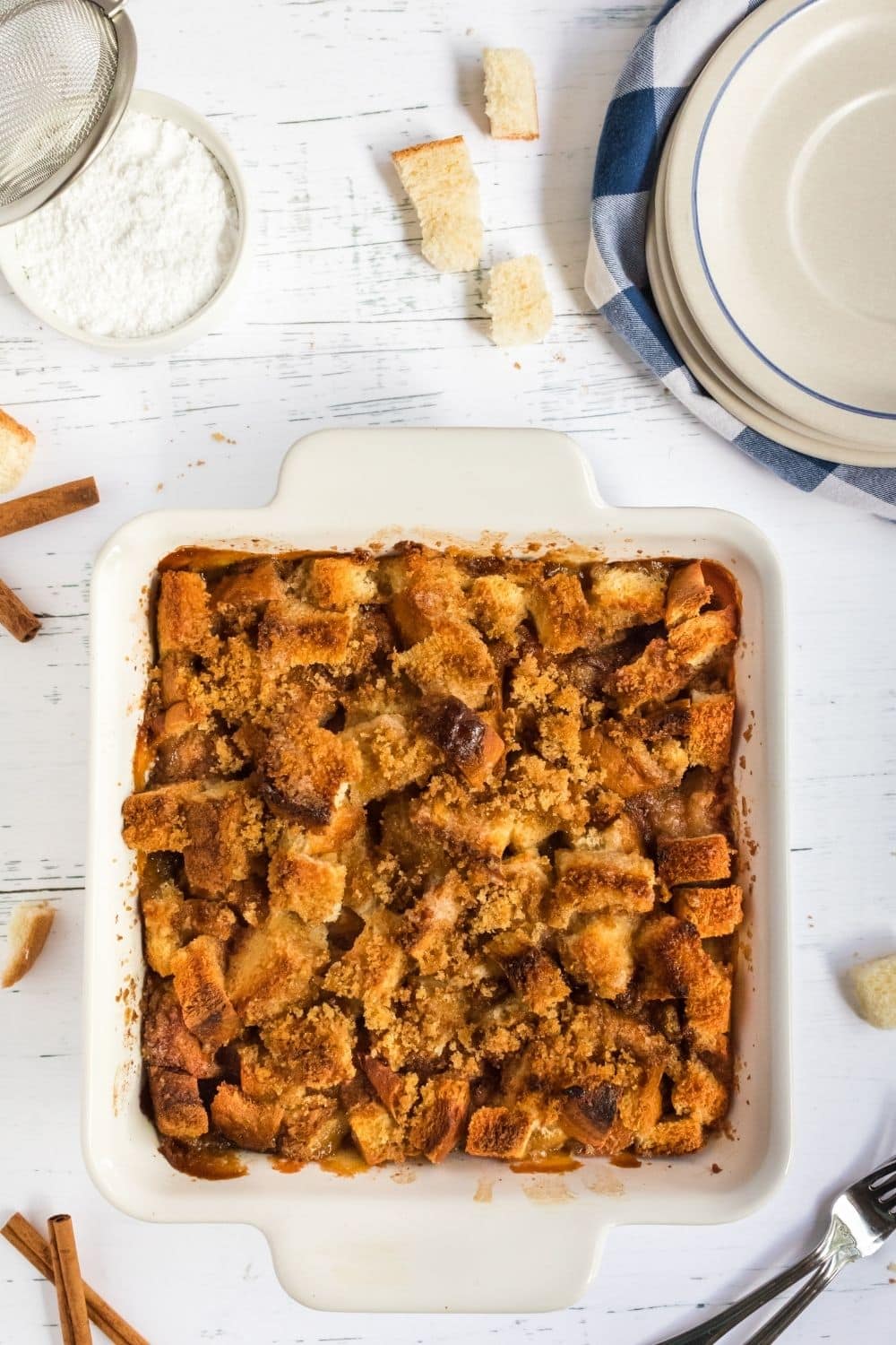 Top down view of a casserole dish filled with a baked French Toast Breakfast Casserole - Hostess At Heart