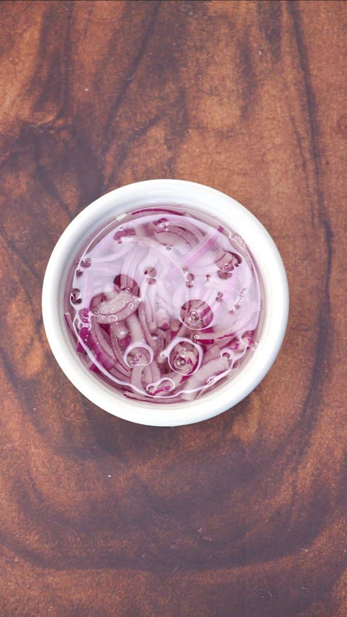 Onions soaking in cold water.