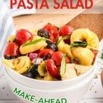 Image for Pinterest of a bowl filled with a colorful summer cheese tortilla pasta salad - Hostess At Heart