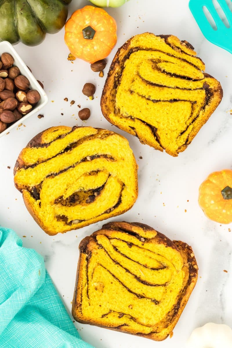 Top down view of slices of hazelnut babka bread with slices of chocolate filling - Hostess At Heart