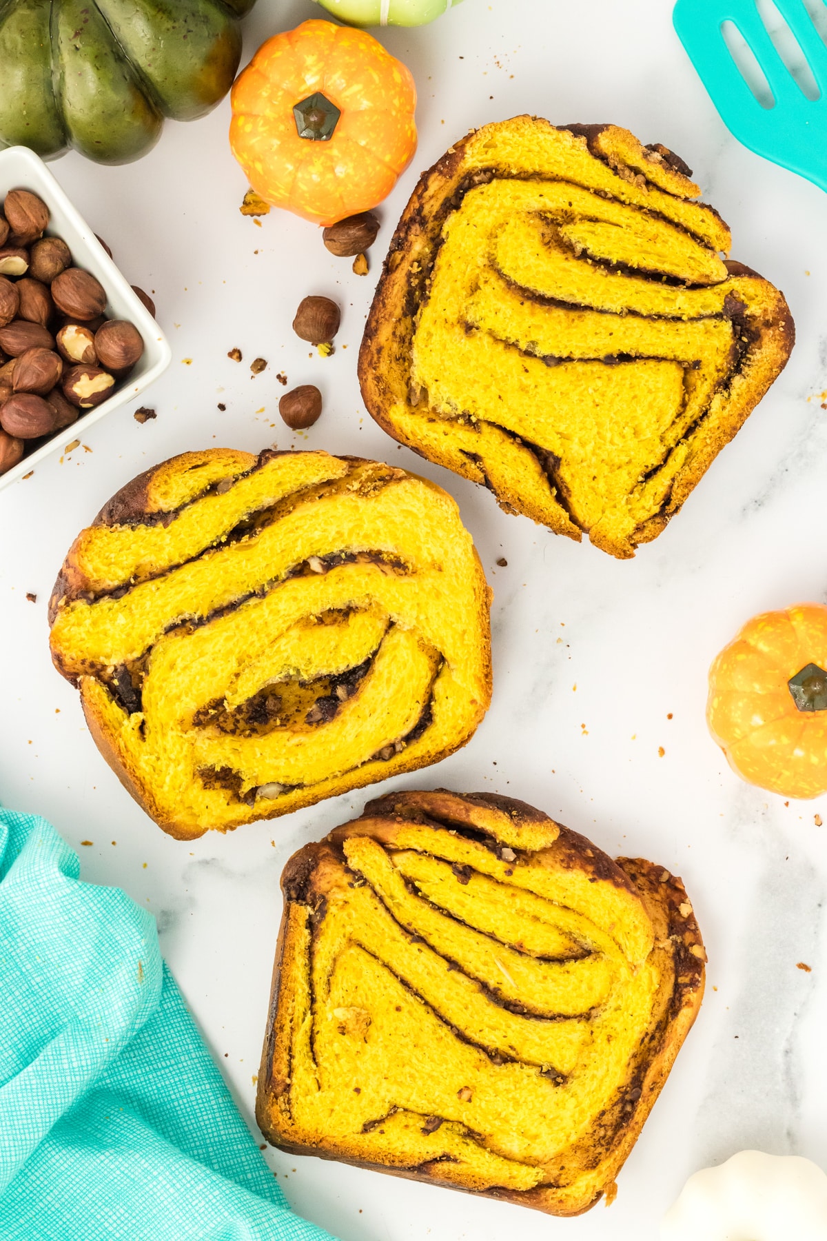 Top down view of slices of hazelnut babka bread with slices of chocolate filling - Hostess At Heart