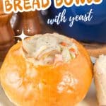 An image for Pinterest of a golden brown bread bowl made from yeast hollowed out and filled with chowder - Hostess At Heart