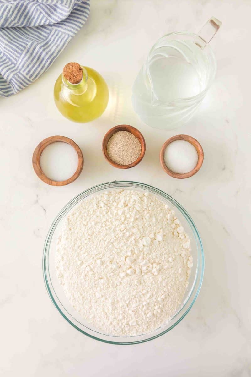 Ingredients used to make bread bowls: flour, salt, yeast, olive oil, water, and sugar. Hostess At Heart