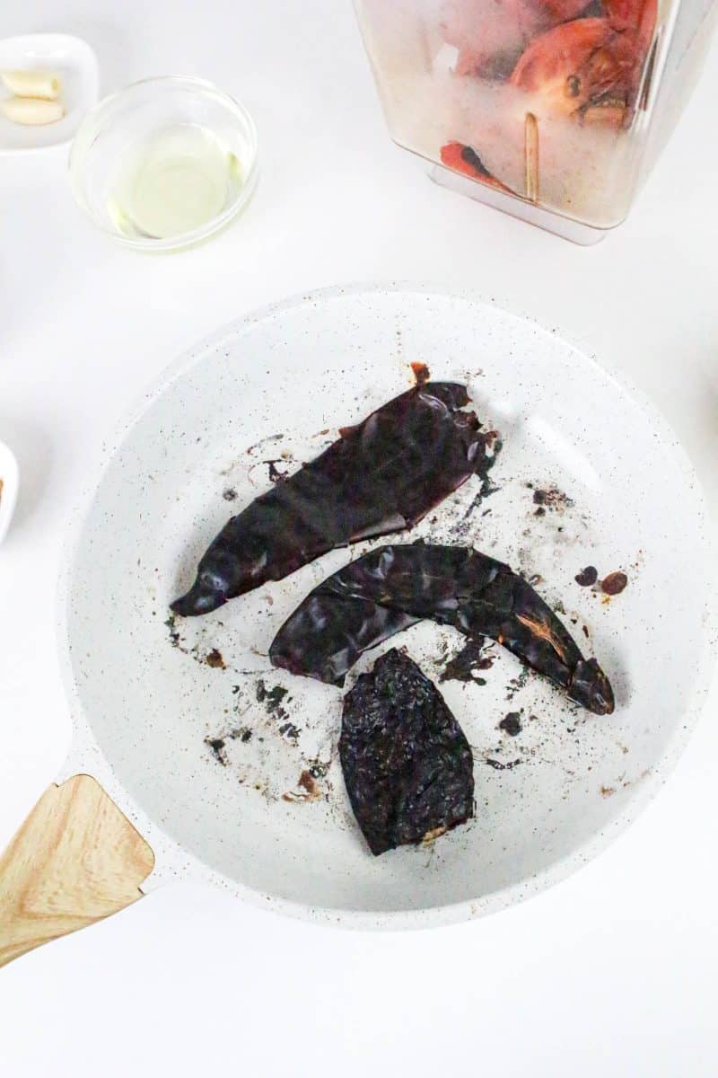 A plate holding dried and roasted chilies - Hostess At Heart