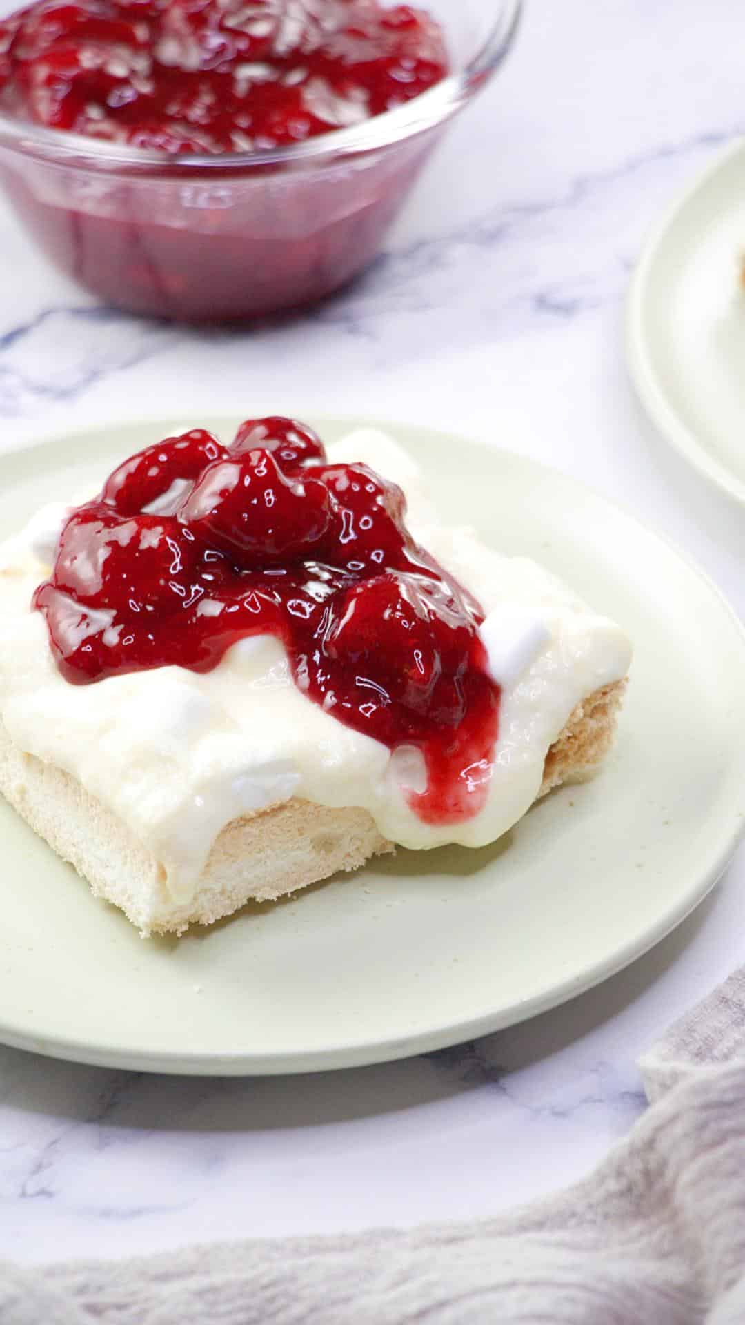 A meringue bar topped with a cherry raspberry sauce - Hostess At Heart