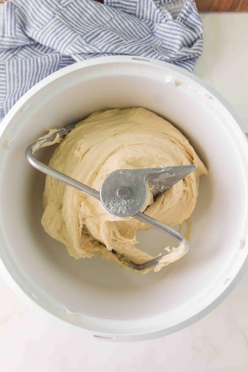Bread dough that's been kneaded with a dough hook in a electric mixer - Hostess At Heart