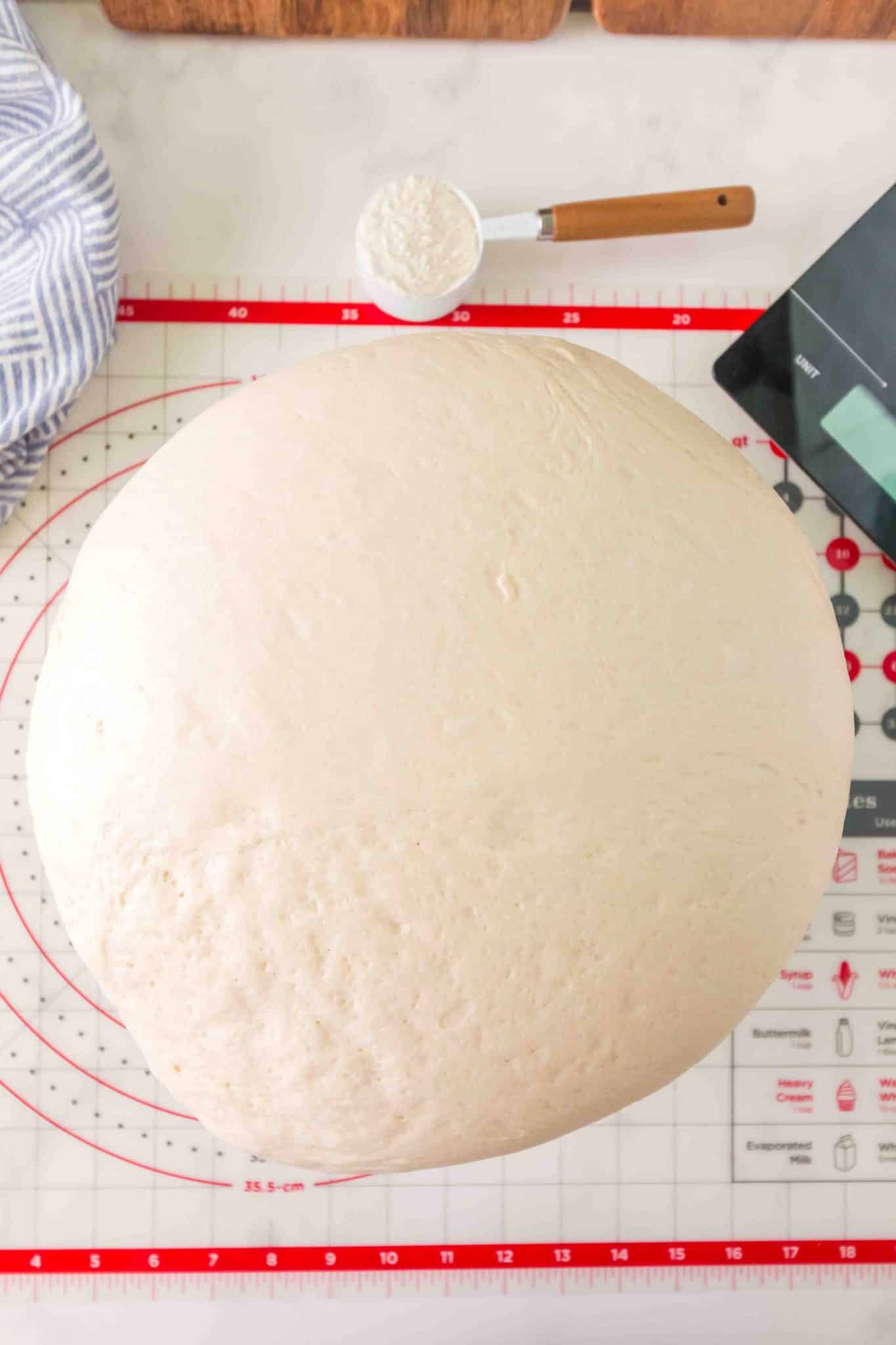 Proofed bread dough in the shape of a boule - Hostess At Heart