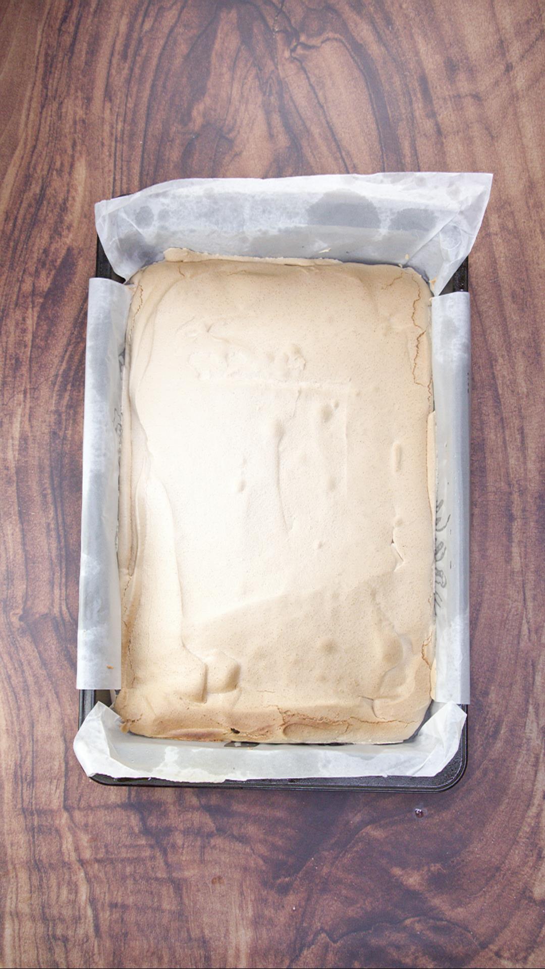 A baking dish filled with golden-brown baked meringue - Hostess At Heart