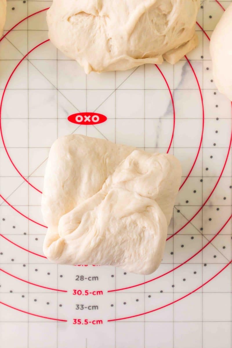 A piece of bread dough that's been folded like an envelope - Hostess At Heart