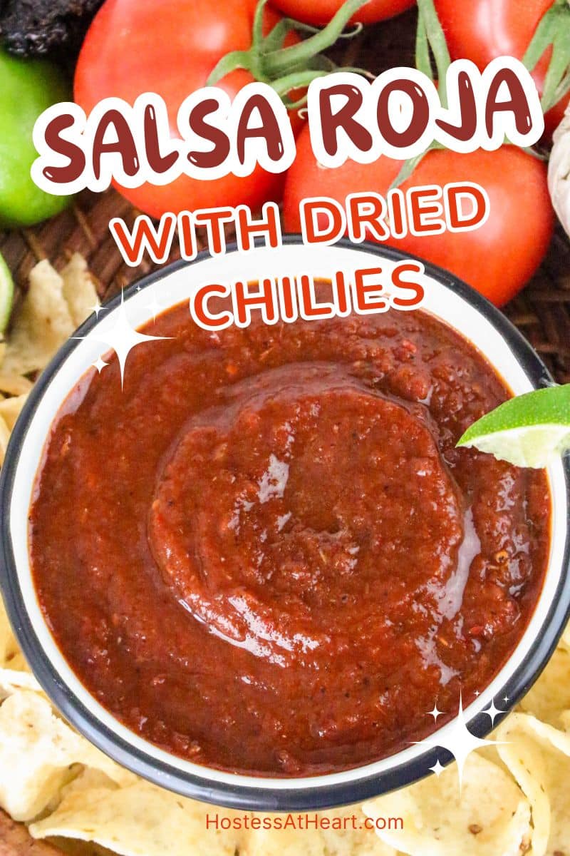 An image for Pinterest of a bowl of salsa rojo surrounded by tortilla chips - Hostess At Heart