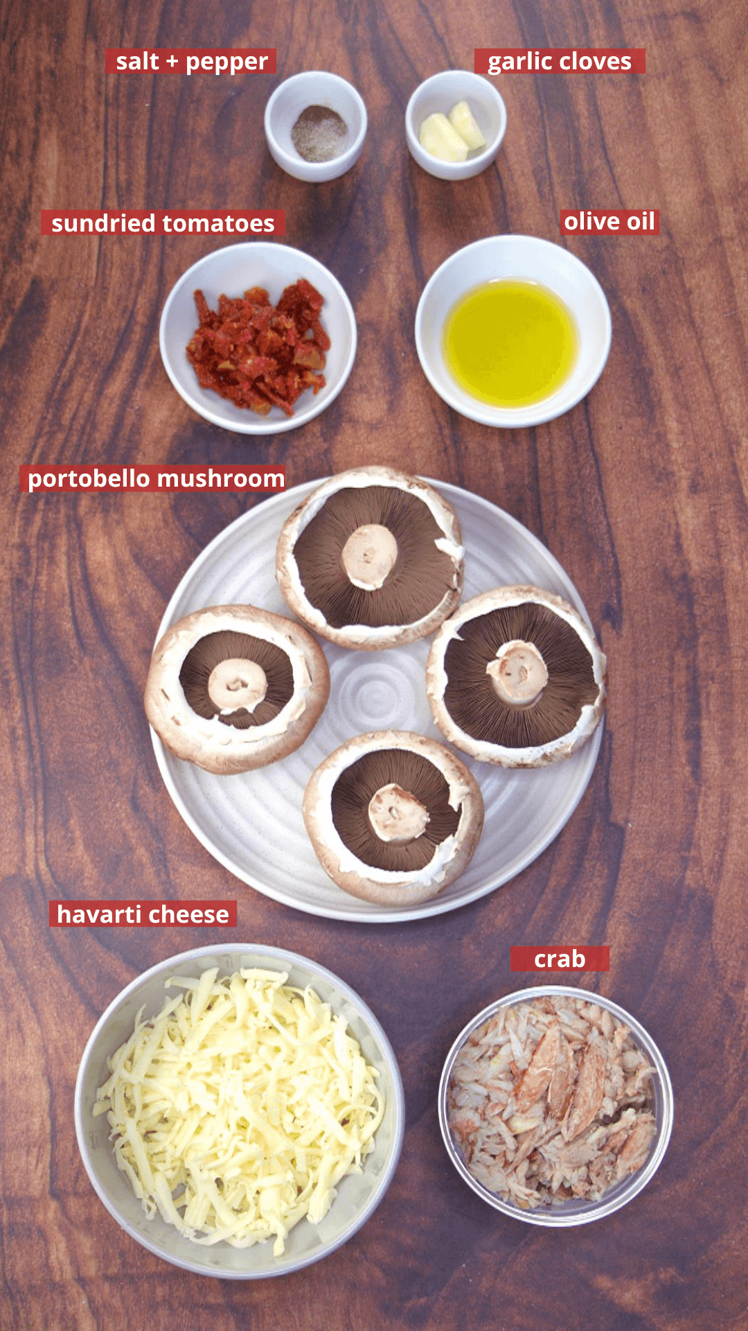Ingredients: Shredded Havarti cheese, lump crab meat, sun dried tomatoes, olive oil, salt and pepper, portobello mushroom caps, and garlic cloves.