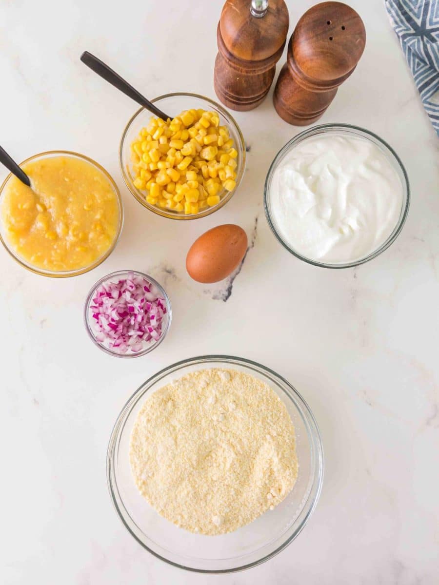 Ingredients: Jiffy corn muffin mix, sour cream, creamed corn, whole kernel corn, chopped onion. Hostess At Heart