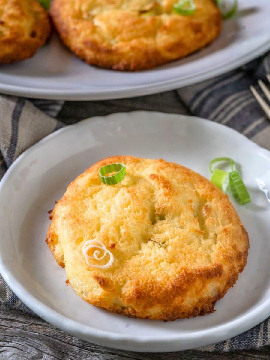 Top down view of a golden brown crispy baked potato cakes - Hostess At Heart