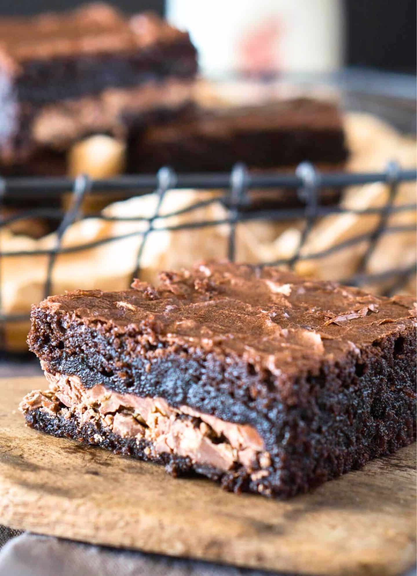 Tableview of a dark chocolate brownie with a toffee candy bar baked into the center - Hostess At Heart
