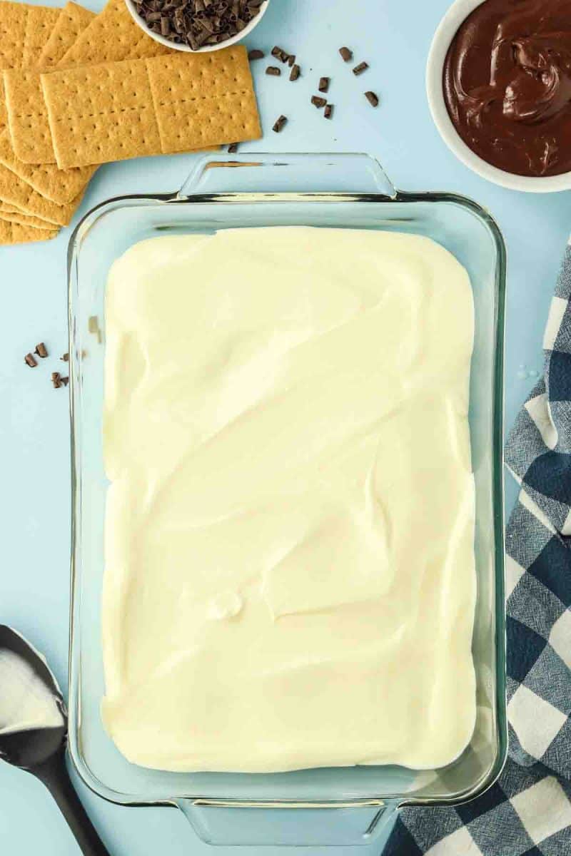 A creamy vanilla pudding mixture layered over graham crackers - Hostess At Heart
