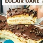 An image for Pinterest of a Close-up of no-bake eclair cake slice showing creamy pudding layers between softened graham crackers and topped with chocolate ganache and chocolate curls - Hostess At Heart